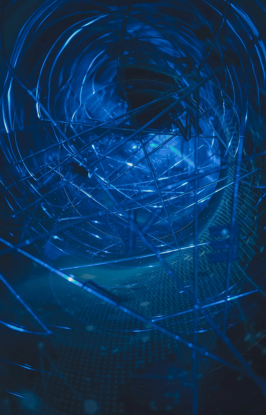 Blue glowing lines intersect to form a dense abstract network structure.